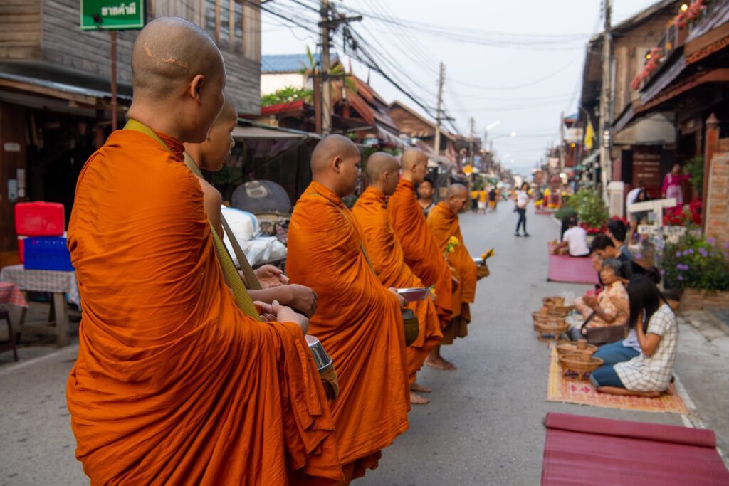 Alm Giving in the Morning at Chiang Khan Old Town