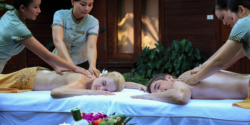 Couple getting a Thai massage
