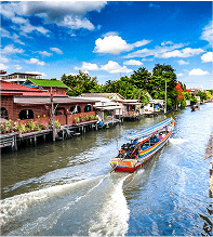 image of boat travelling in thailand canal